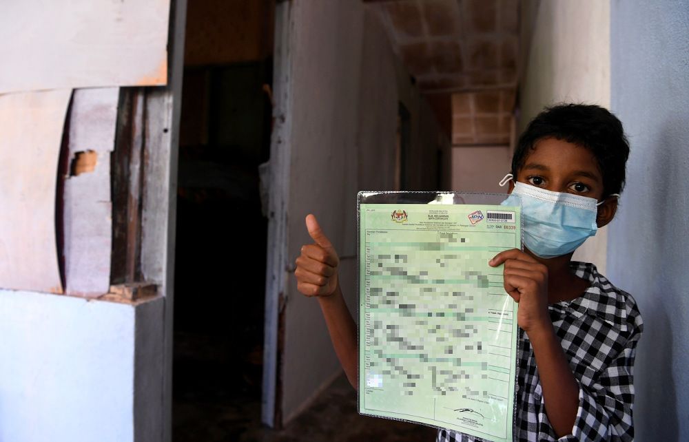 Eight-year-old boy in Penang gets Malaysian birth certificate as birthday gift