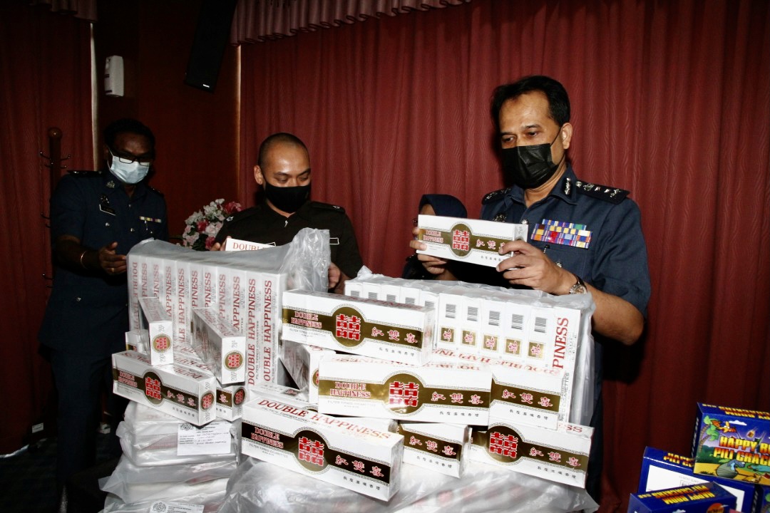 Johor authorities seize RM60,000 contraband cigarettes hidden in fish barrels