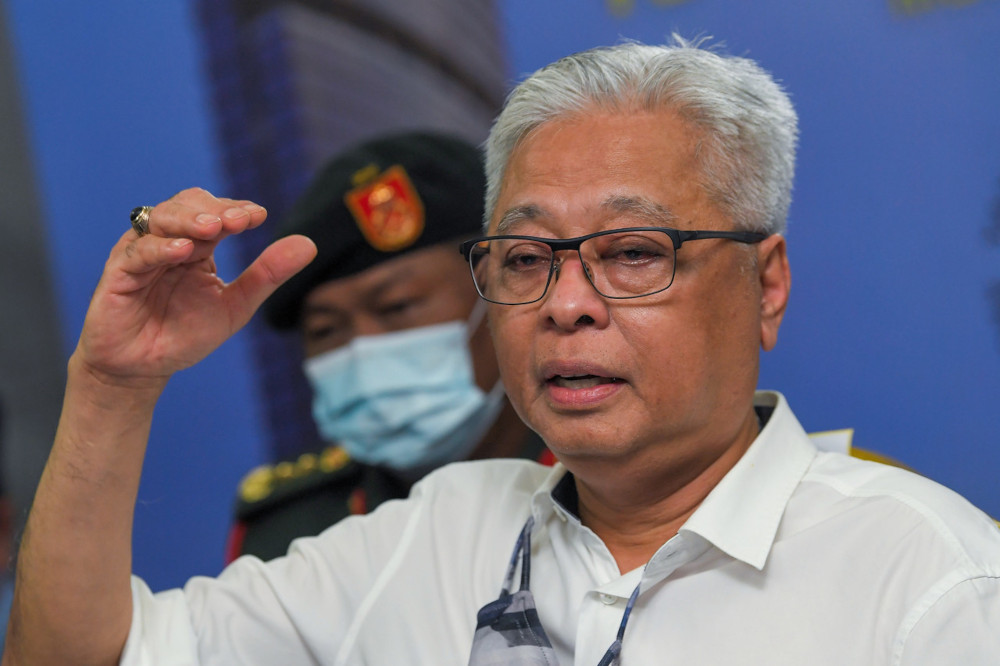 Ismail Sabri justifies decision against total lockdown as need to balance lives vs livelihood