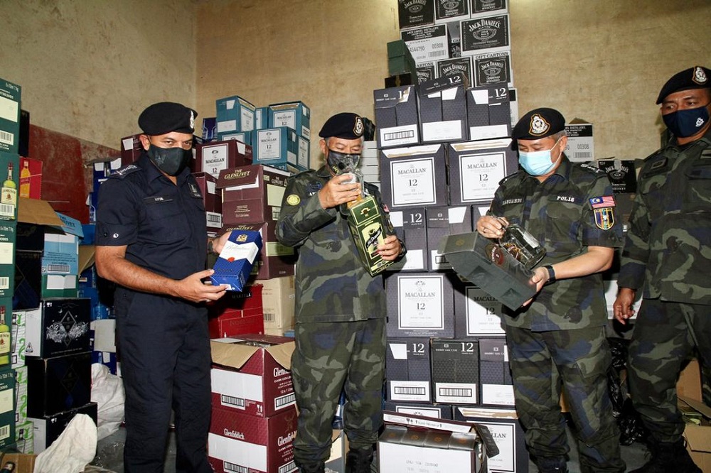In Johor, cops cripple liquor smuggling syndicate with RM9.56m worth of seizure
