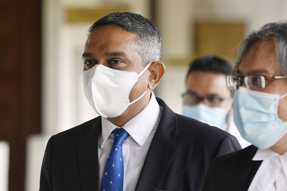 Umno lawyer Mohd Hafarizam freed of RM15m money laundering charges