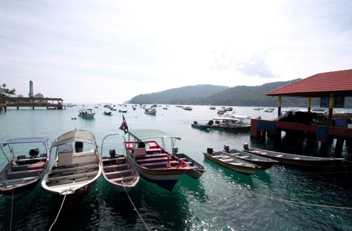 In Pulau Perhentian, ‘kuih’ seller proceeds with business despite lack of tourists