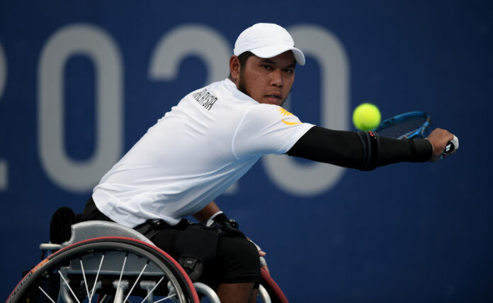 Malaysia’s wheelchair tennis player Abu Samah fights back from set down to move into second round at Tokyo Paralympics