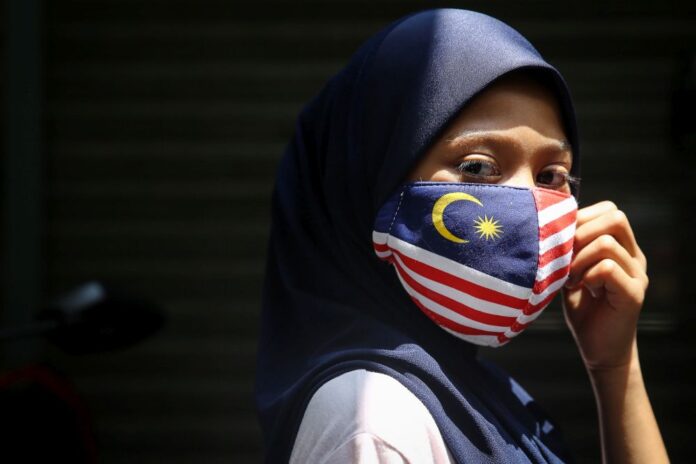 Despite massive Covid-19 vaccination drive, experts say new norm could remain in Malaysia for years