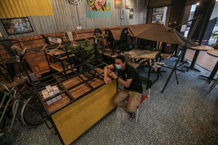 Malaysian employers urge Putrajaya to allow businesses to reopen while keeping state borders closed