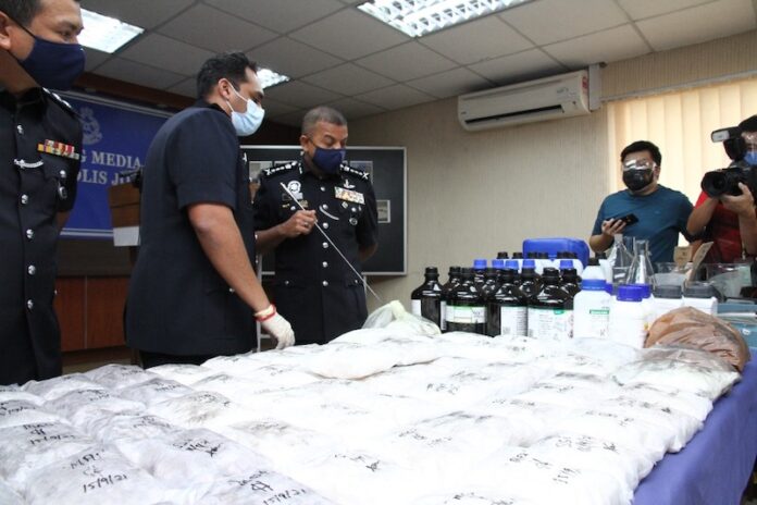Johor police cripple month-old illicit drug syndicate with arrest of 10 members