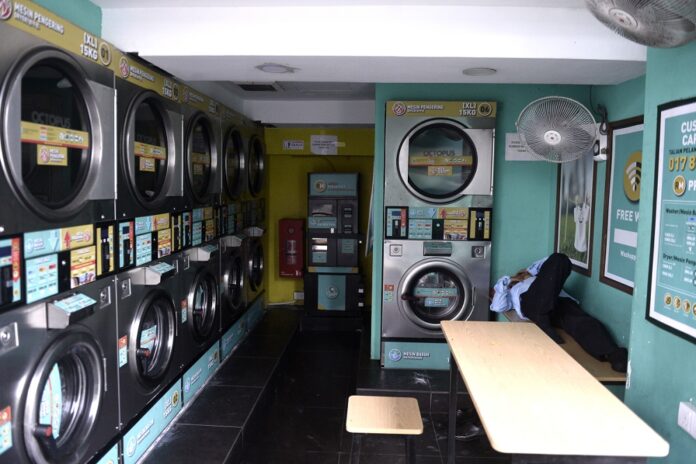 Energy Commission says laundrette operators must obtain approval, gas licence to uphold safety