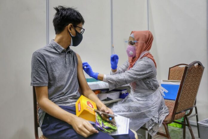 Covid jabs for teens under 18 starting next week, says Sarawak DCM