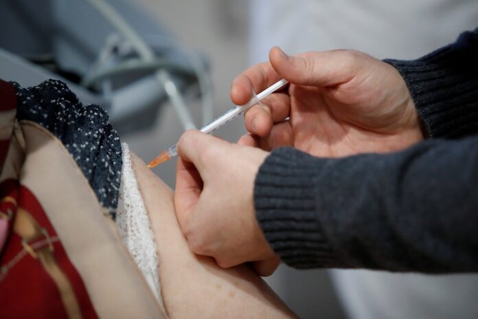 Canada makes Covid-19 vaccines mandatory in House of Commons