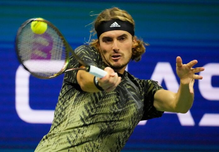 Tsitsipas retires with arm injury as seeds fail in Paris
