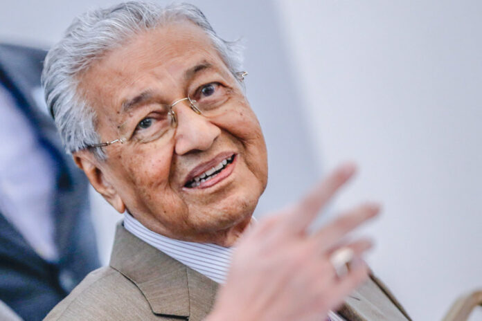 Dr Mahathir denies claims of using cryptocurrency