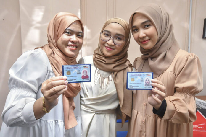 In Kelantan, women swapped at birth get new identity cards