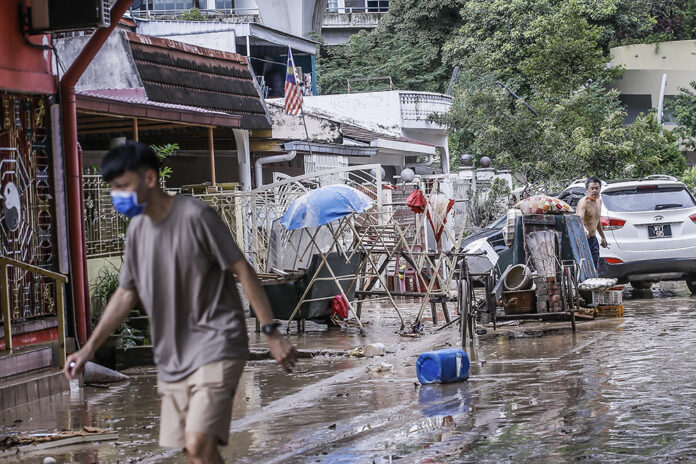 Insurers to help Malaysia's flood victims by speeding up insurance claims process; list 24-hour hotlines