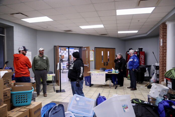 Devastated Kentucky tornado survivors pick through debris, shelter with relatives