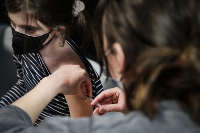 Portugal, France begin vaccinating younger children