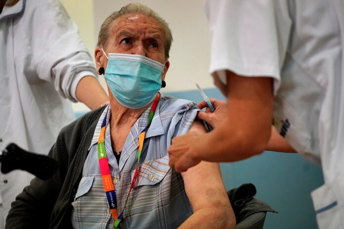 As Covid cases rise, Spain approves booster shots for over 40s