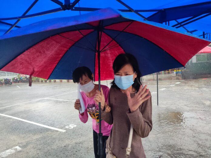 Sarawak polls: Voters brave heavy downpour in Sibu to cast ballots