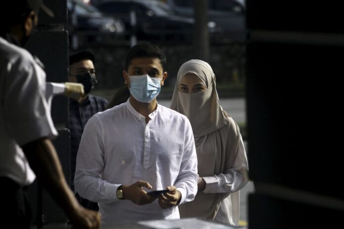 Neelofa, husband get discharge not amounting to acquittal for CMCO SOP breach during carpet shop visit