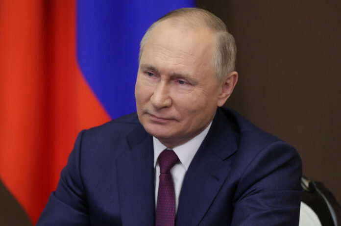 Putin says Russia 'firmly' defended interests in 2021