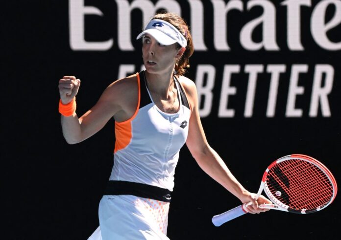 Cornet upsets Halep in brutal heat to make Slam quarter on 63rd attempt