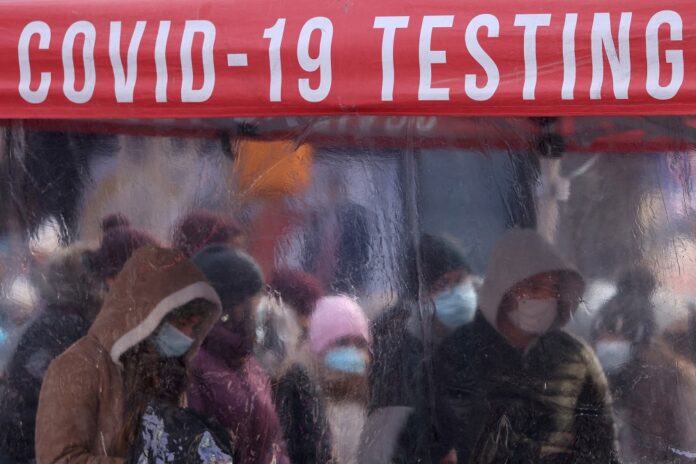 US reports nearly one million Covid-19 cases in a day, setting global record