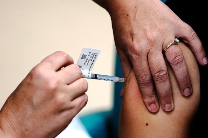 CDC recommends Pfizer's Covid-19 booster for ages 12 to 15