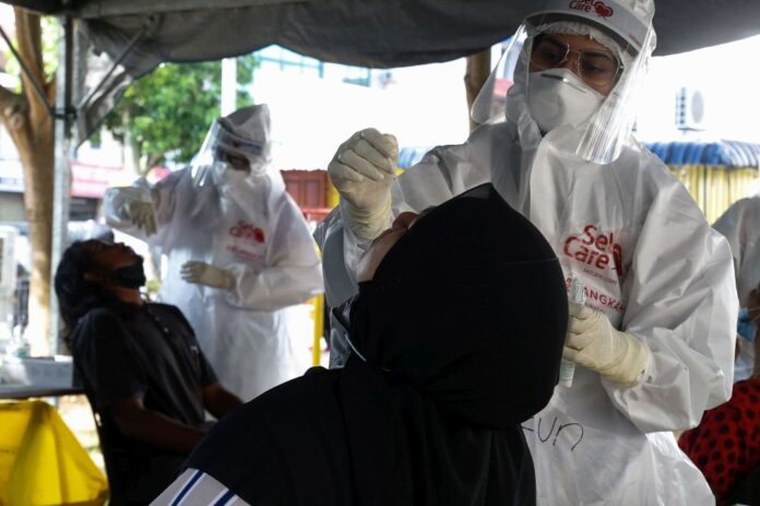 Malaysia sees new Covid-19 cases dip to 3,386 at the turn of the year