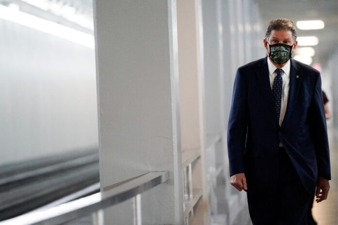 Senators meeting with Manchin on voting rights bills, says Senate majority leader