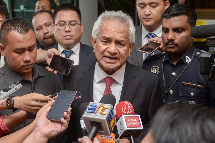 Ex-AG Tommy Thomas denies bribery involved in reduced drug charges against tycoon's son