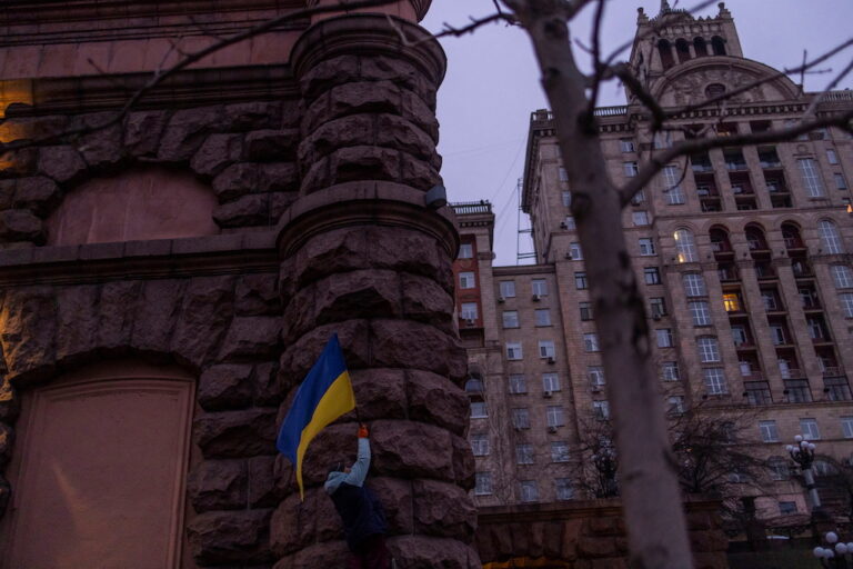 ‘We fear no one:’ Ukrainians raise flags to defy Russia invasion fear