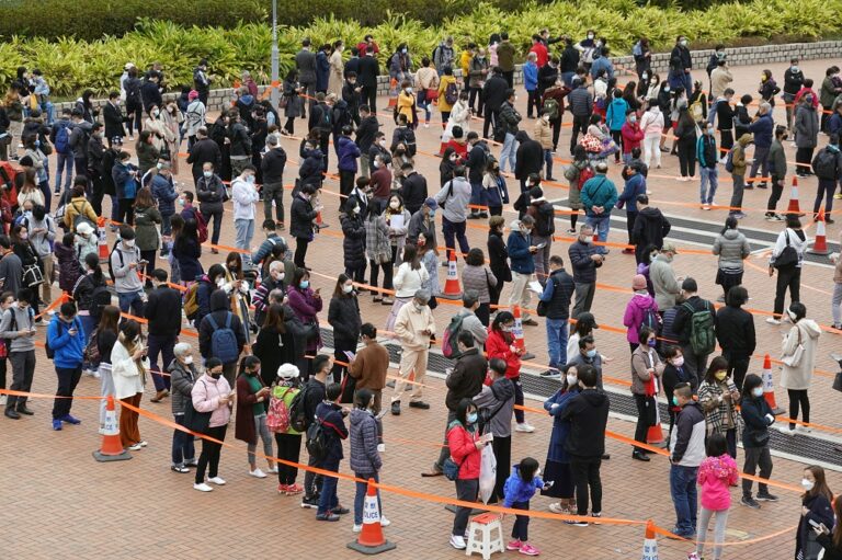 China steps in to steer Hong Kong's Covid crisis as risks loom