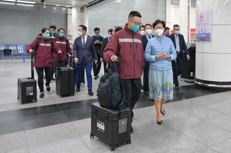 Hong Kong says 20,000 hotel rooms earmarked for quarantine as Covid cases surge
