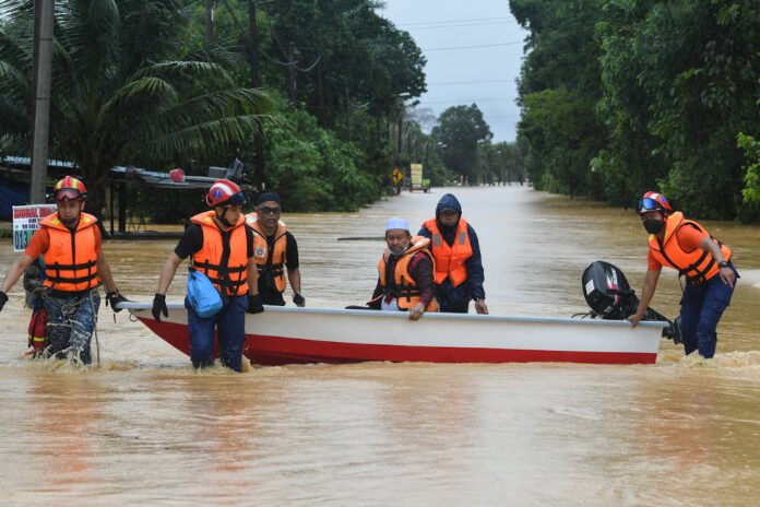 Ajil assemblyman nearly swept away during flood aid mission in Terengganu