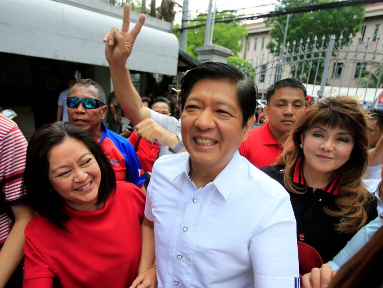 Philippines marks Marcos overthrow as son homes in on presidency