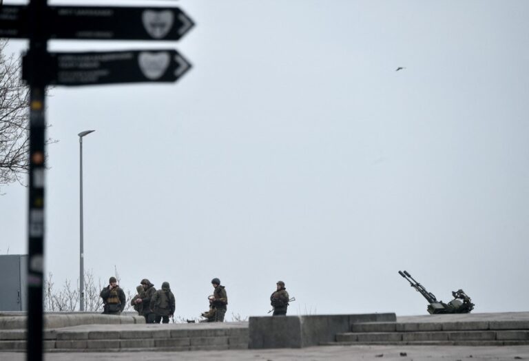 Invading Russian forces press deep into Ukraine