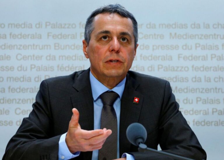 Neutral Swiss adopt EU sanctions against Russia in break with past