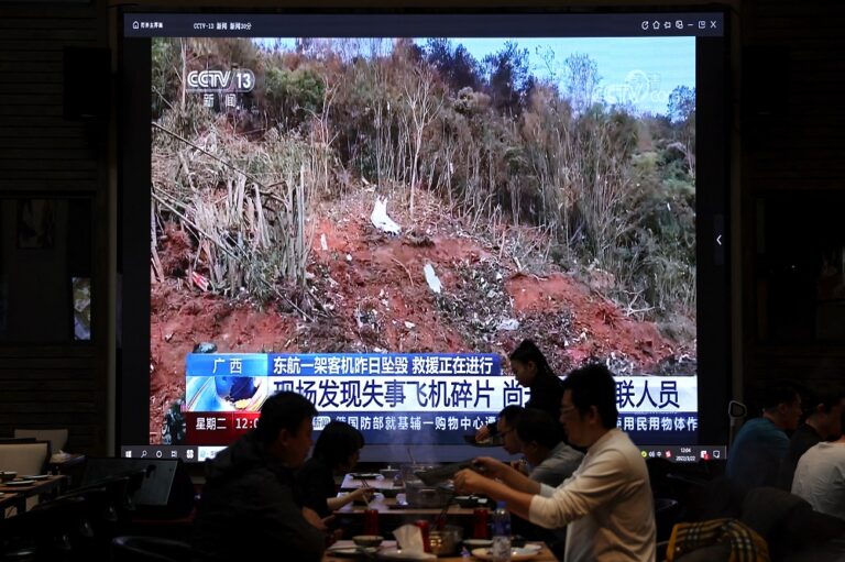 China searches for survivors from plane crash with cause still unclear