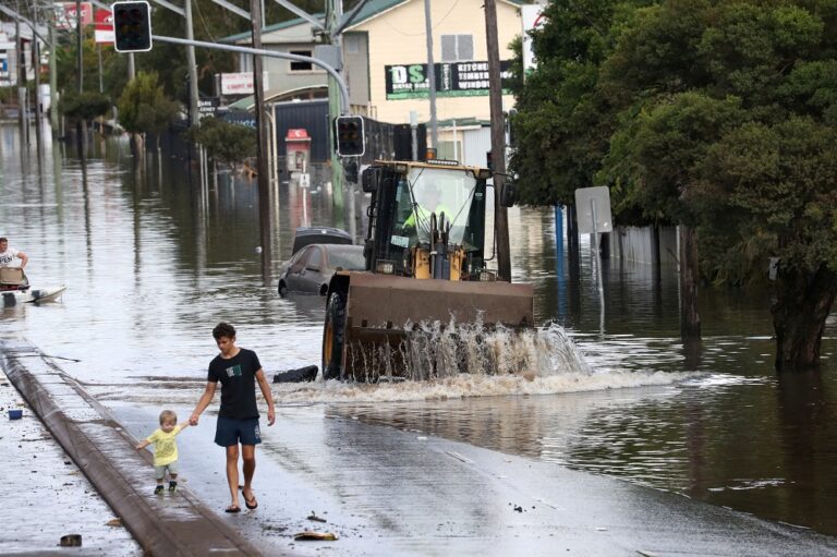 Relentless rains submerge Australian towns for second time in a month