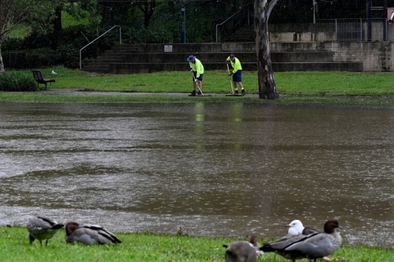 Flooded Australian towns brace for more rains, several people still missing