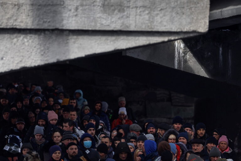 Ukrainians flee some besieged areas through ‘humanitarian corridors’