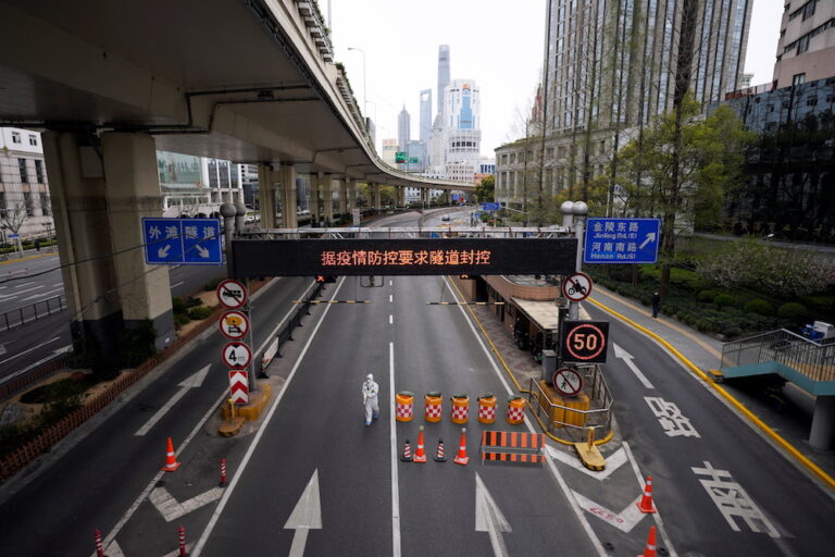 China’s Shanghai launches two-phase lockdown as Covid surges