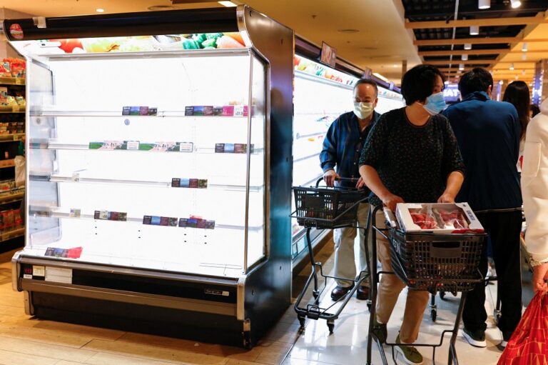 Hong Kong transport operators, supermarkets cut services as Covid cases surge