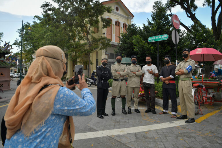 Penang cops in 1807 uniform draw curious looks from tourists
