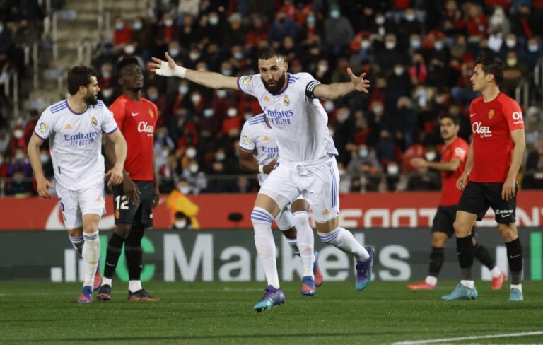 Benzema scores twice but hurts calf as Real extend La Liga lead