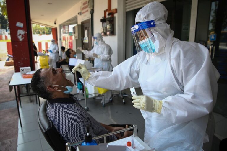 Malaysia logs 32,800 new Covid infections, 76 deaths