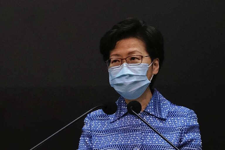 Hong Kong to ease strict Covid measures from April, lifts flight ban