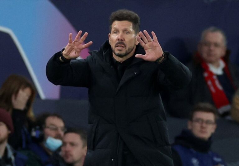 Man United facing likely Uefa action after fans hurl objects at Simeone
