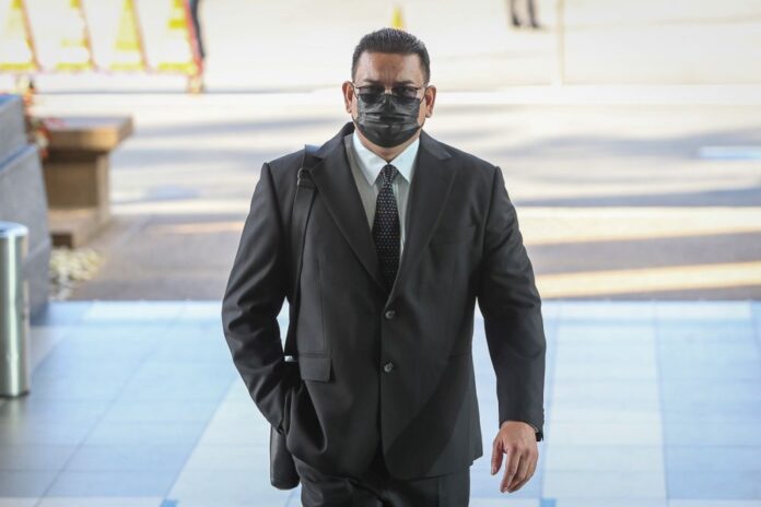 Lokman Adam denies defaming Khairy, says merely seeking clarification on Covid vaccine