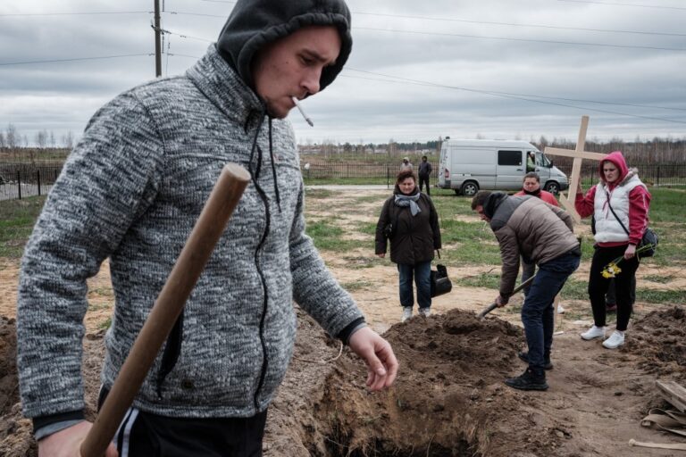 Bodies with hands tied found in Ukraine as Russia shells east