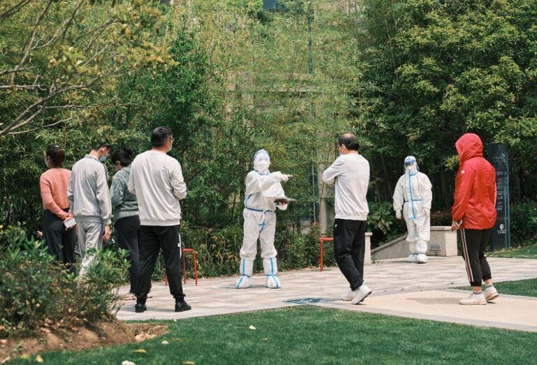 Shanghai to keep Covid curbs as infections outside quarantine rise again